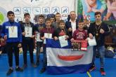 Discipolii Școlii sportive raionale s-au &icirc;ntors cu 8 medalii de la Campionatul municipiului Chișinău la kickboxing