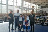 Campionii şi medaliatul cu bronz din cadrul Campionatului internaţional la kickboxing